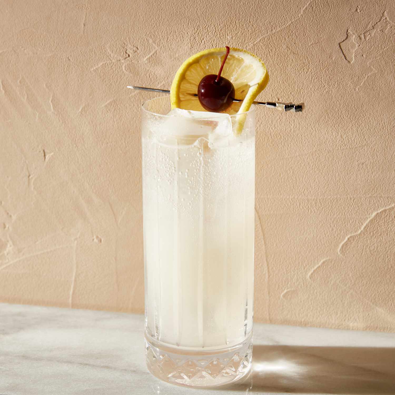 TOM COLLINS